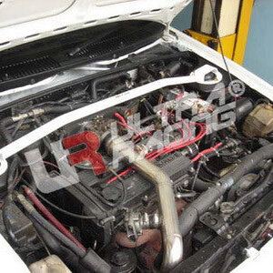 Ultra Racing sprednja zgornja opornica za Mazda 323 BF/Ford Laser KF (brez uplinjača)
