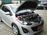 Ultra Racing sprednja zgornja opornica blažilnikov za Mazda 2 II (DE)